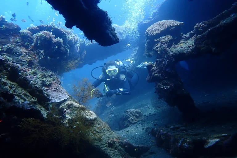 Divers preparing for a multi-day dive package in Amed