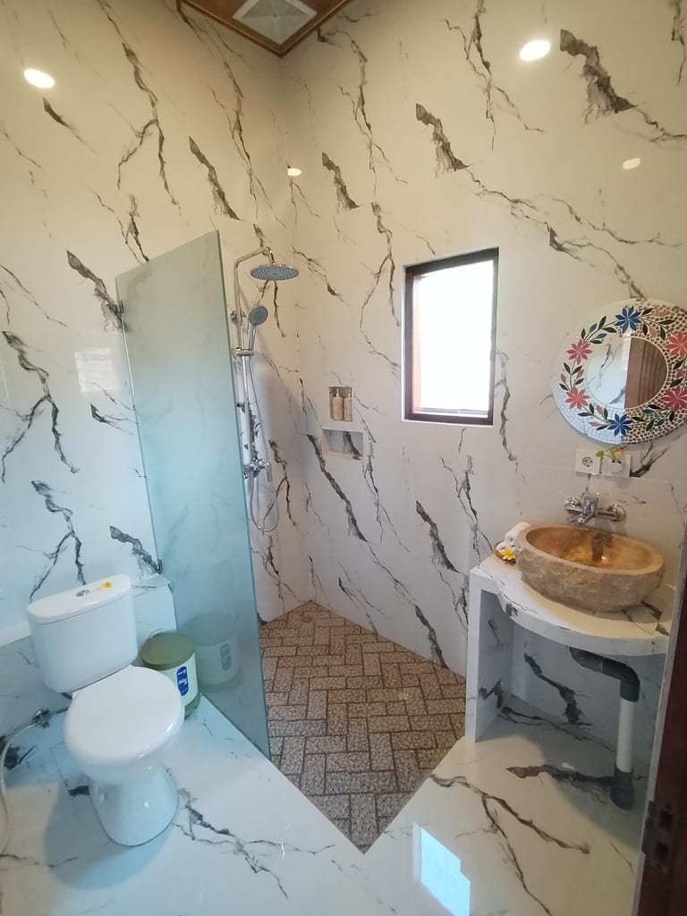 Walk-in shower at Pondok Idaman — bathroom view 1