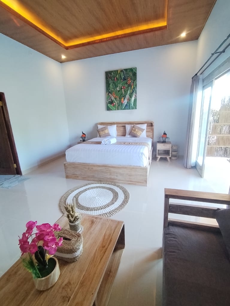 Deluxe Sea-View Room at Pondok Idaman — slightly larger Amed homestay room